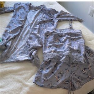 Pajama/ night set with matching robe. Includes cami and shorts.